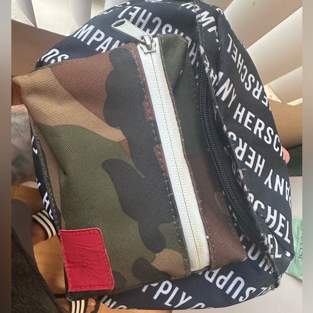 Herschel Fanny Pack, Black/ Camo, like new, no stains, rips, tears or blemishes.